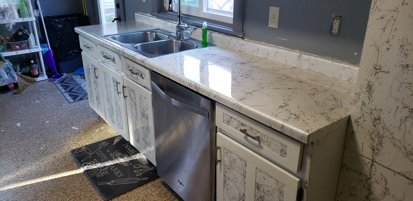 Epoxy restored kitchen countertop in a white marble look by DC Coatings, Green Bay, WI