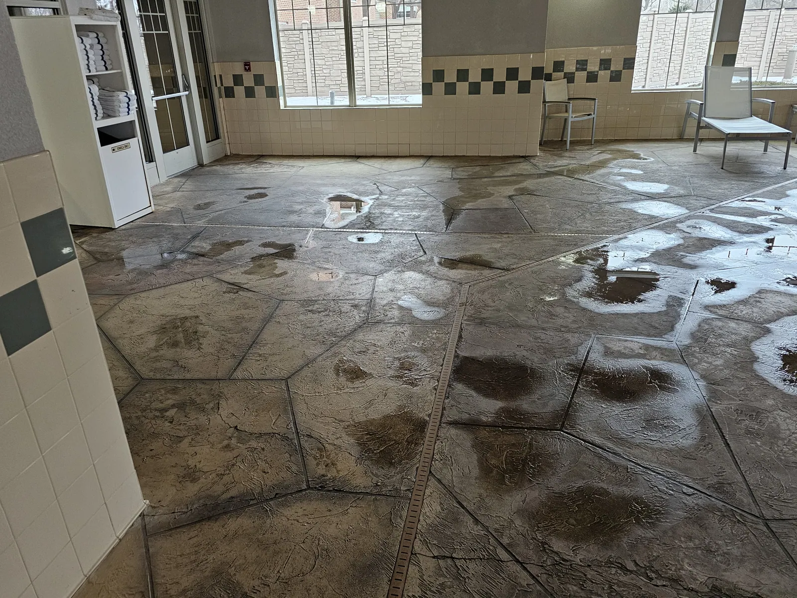 Comfort Inn hotel pool area before work started by DC Coatings